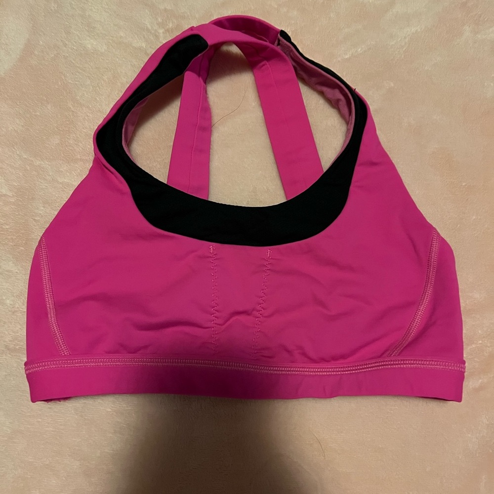 Hot pink and black sports bra